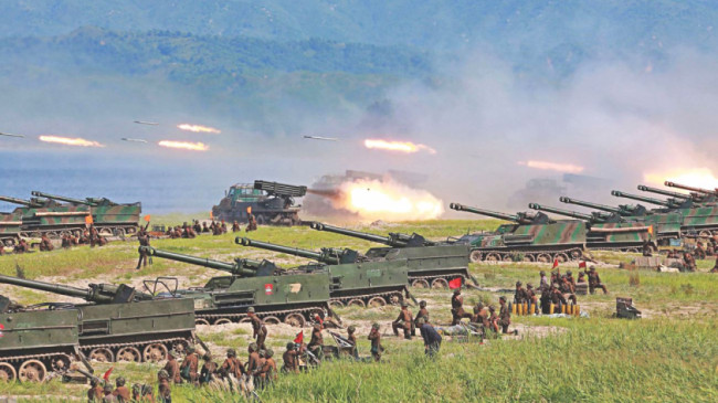 North Korea uses multiple-rocket launcher to test missiles North Korea uses multiple-rocket launcher to test missiles