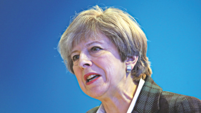 Theresa May waters down 'dementia tax' in humiliating Tory U-turn