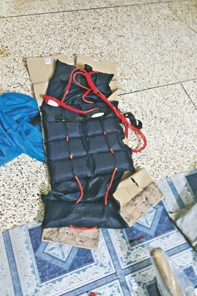 suicide vests, bombs, militants weapons