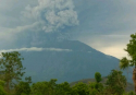 Bali's erupting volcano raises air travel warnings