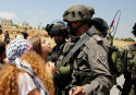 Hitting Israeli soldiers: Palestinian girl sparks debate