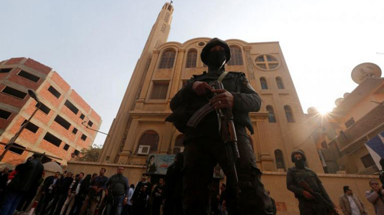 Security forces stand guard at the site