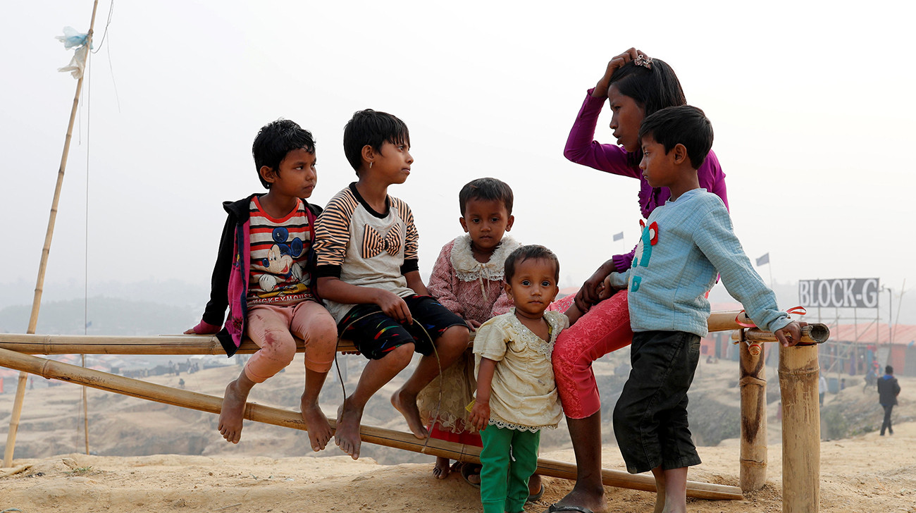 Burma leader says probe of mass grave 'positive'