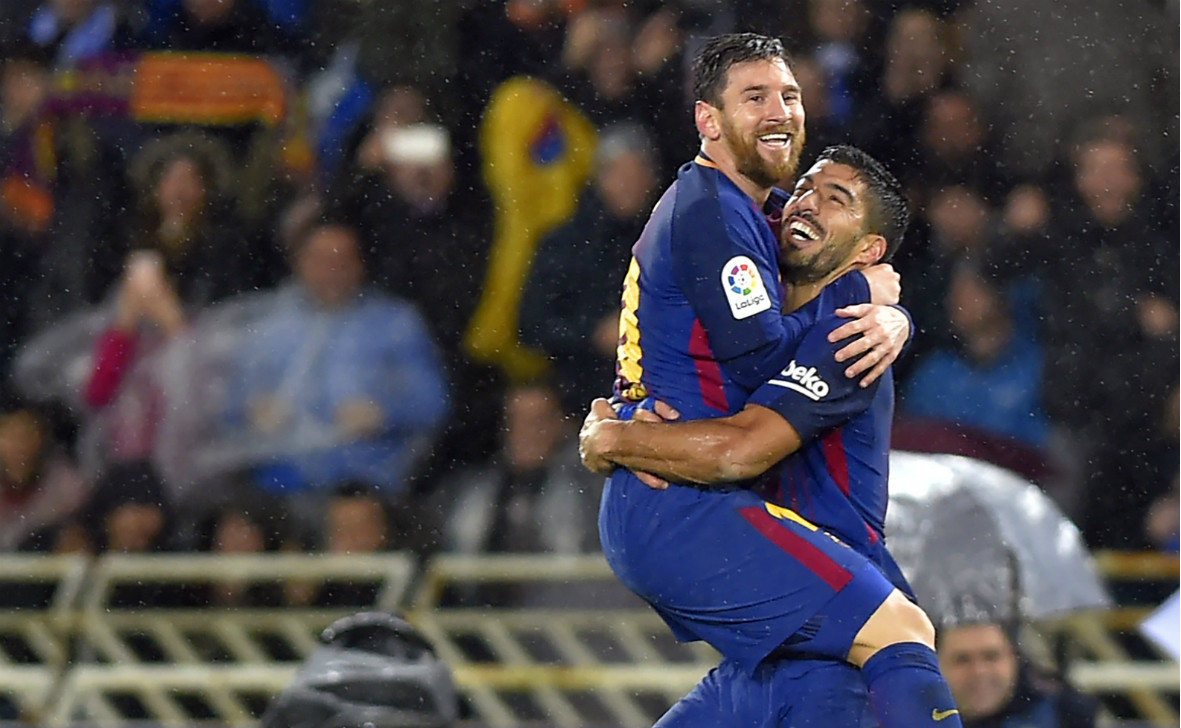 Lionel Messi and Luis Suarez