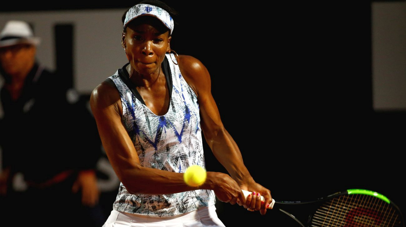 Venus Williams of the United States returns the ball. File