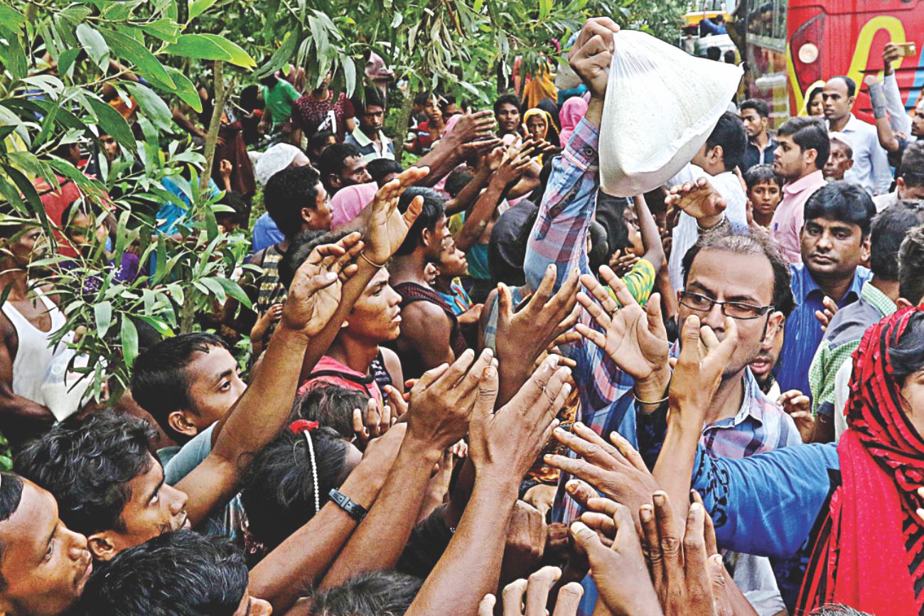 Shared food, homes for some refugees