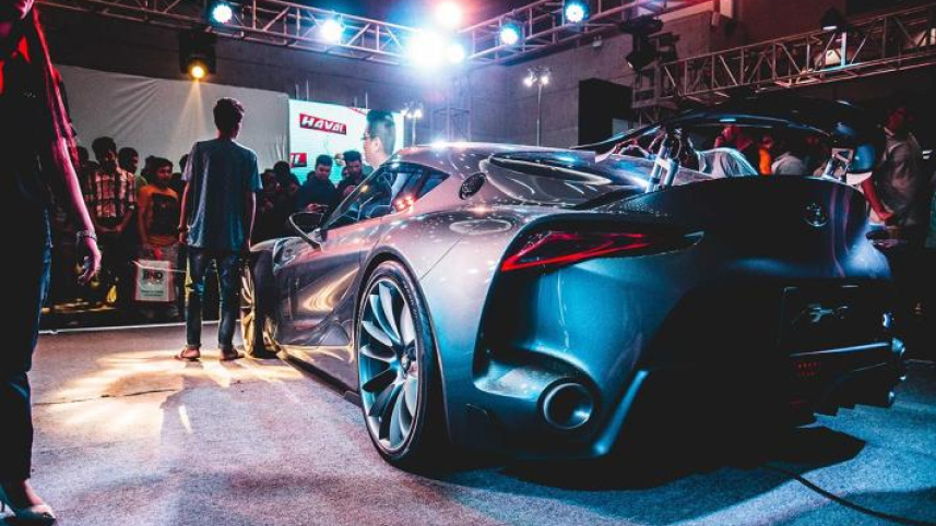 Crowds_throng_a_stall_by_Japanese_manufacturer_Toyota_at_the_2018_Dhaka_Motor_show.jpg