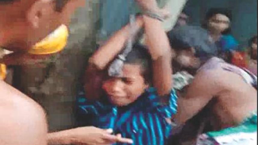 boy tortured.jpg