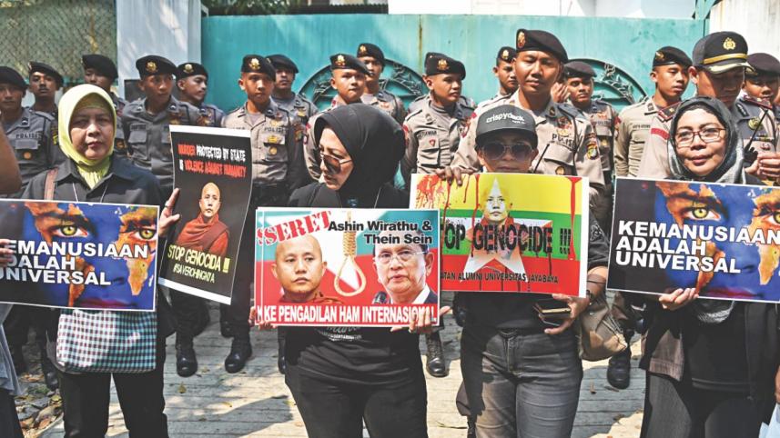 Suu-Kyi-side-migrants.jpg