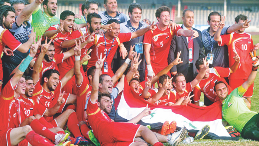 Syria players celebrate.jpg