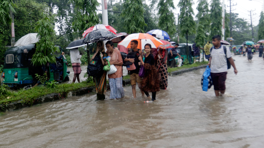 People looking for shelter in the flood, photo taken in Akhalia area of Sylhet