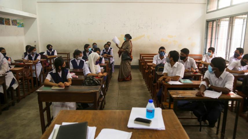 A teacher teaching inside the classroom