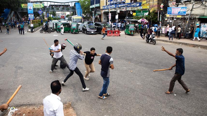 Quota protest violence: Protestor being beaten