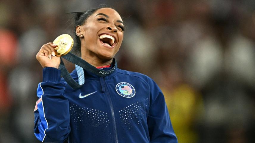 afp_20240803_369k8h6_v2_preview_olympicsartisticgymnasticswomensqualificationco.jpg