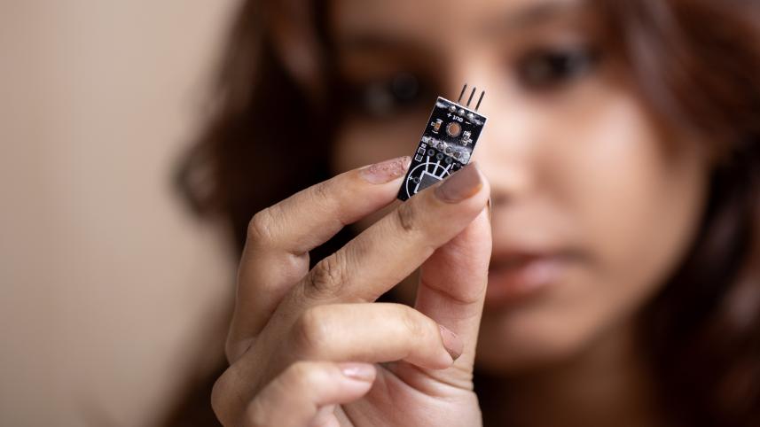 Person looking at an electrical component