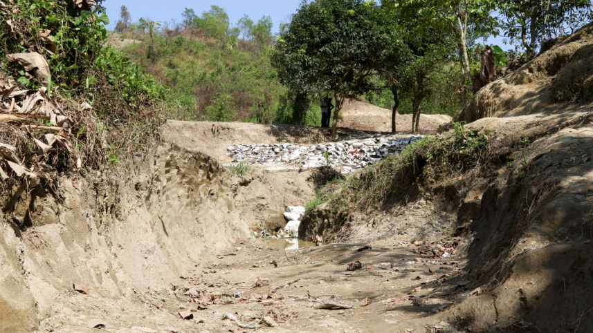 illegal_dam_makeshift_1.jpg