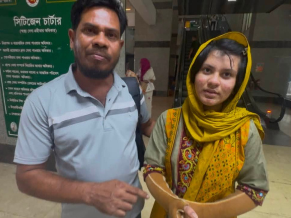 Mehrin Akter with her father Md Salauddin. Photo: Star