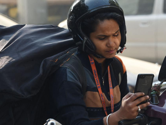 women gig worker AFP.png
