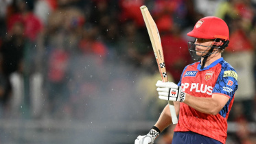 AFP__20260331__A6CP63N__v1__MidRes__CricketIndIplT20PunjabGujarat.jpg