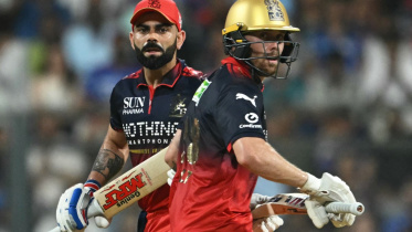 AFP__20260412__A7JE3UH__v1__MidRes__CricketIndIplT20MumbaiBengaluru.jpg