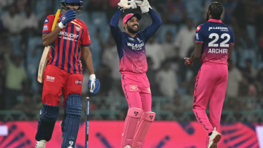 AFP__20260422__A8NF9ED__v1__MidRes__CricketIndIplT20LucknowRajasthan.jpg