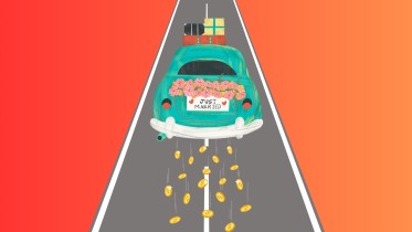 Car with just married sign leaving a trail of coins