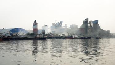 Heavy smog over a dock.   