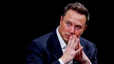 musk-considers-charging.jpg