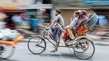 battery-run rickshaws in Dhaka