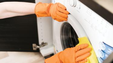 high-angle-woman-cleaning-washing.jpg