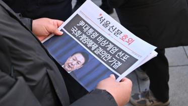 afp_20241204_36pc99w_v1_preview_skoreapoliticsconflict.jpg