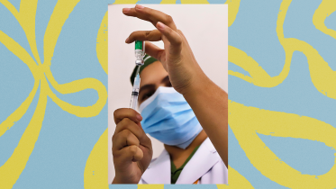 Medical professional preparing a vaccine