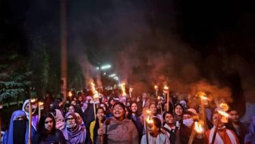 SUST students hold torch procession demanding justice for rape victims