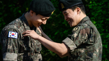 afp_20250611_49ve9yg_v2_preview_topshotskoreaentertainmentbts.jpg