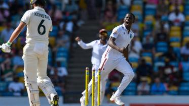 afp_20250626_63y43q6_v1_midres_cricketauswis1sttest.jpg