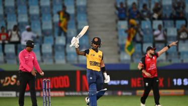 afp_20250915_74la7hv_v1_midres_cricketasia2025t20hkgsri.jpg
