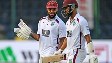 afp_20251012_78h89yz_v1_midres_crickettestindwis.jpg