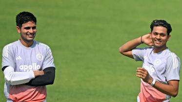 afp_20251111_83n46q7_v1_midres_cricketindpractice_1.jpg