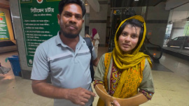 Mehrin Akter with her father Md Salauddin. Photo: Star