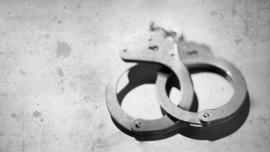 Handcuff Logo