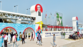 Visitors entering the month-long Dhaka International Trade Fair, which opened at Bangabandhu Bangladesh-China Friendship Exhibition Centre in Purbachal yesterday.