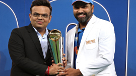afp_20250309_36zn98k_v1_highres_cricketct2025indnzlpodium.jpg