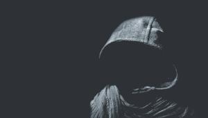 black cloaked