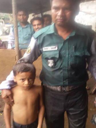 cops rescues kid- photo Aech Sheehab.jpg